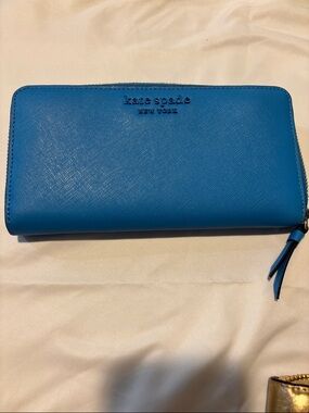 Kate Spade women’s Blue Zip-Around Leather Wallet